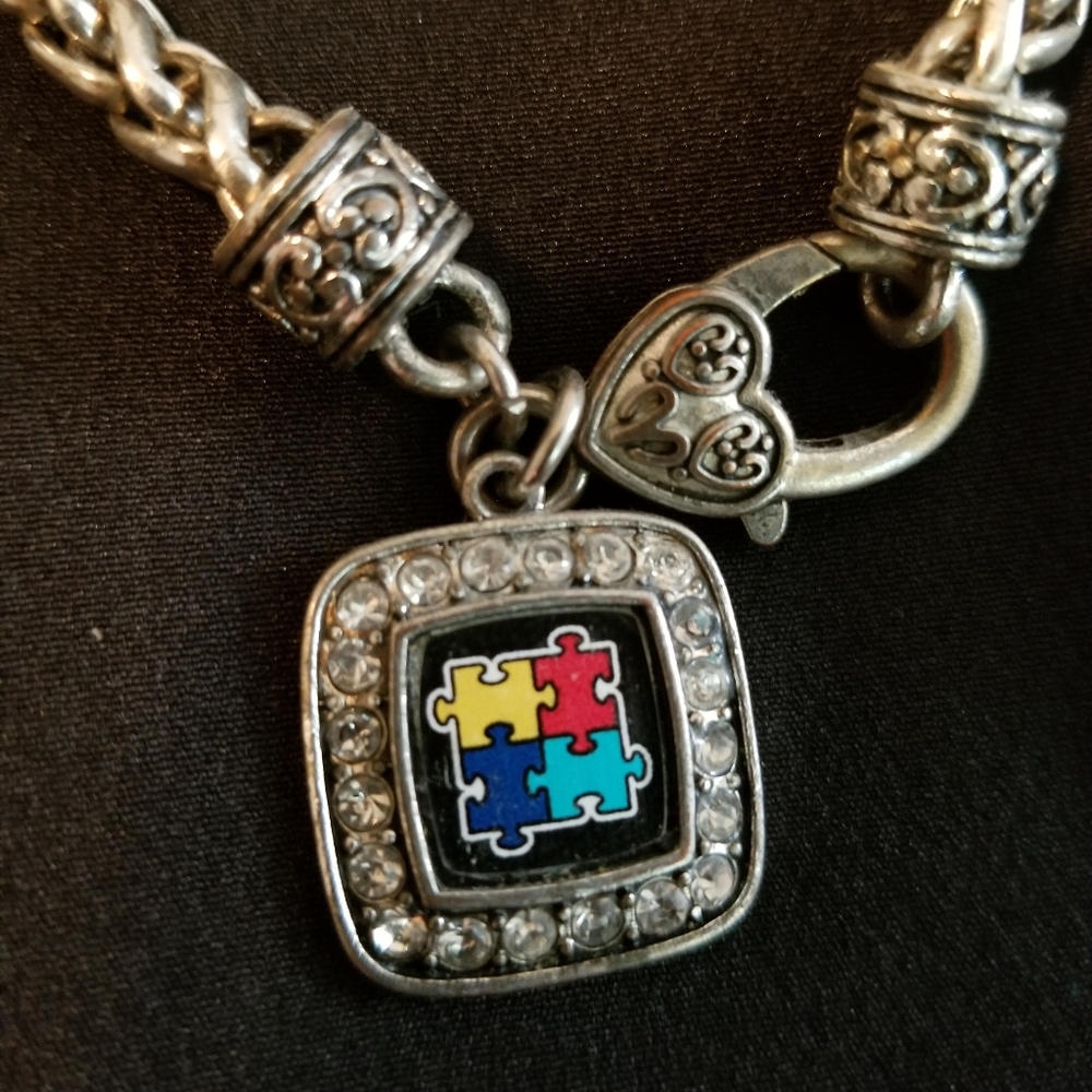 Silver bracelet with charm